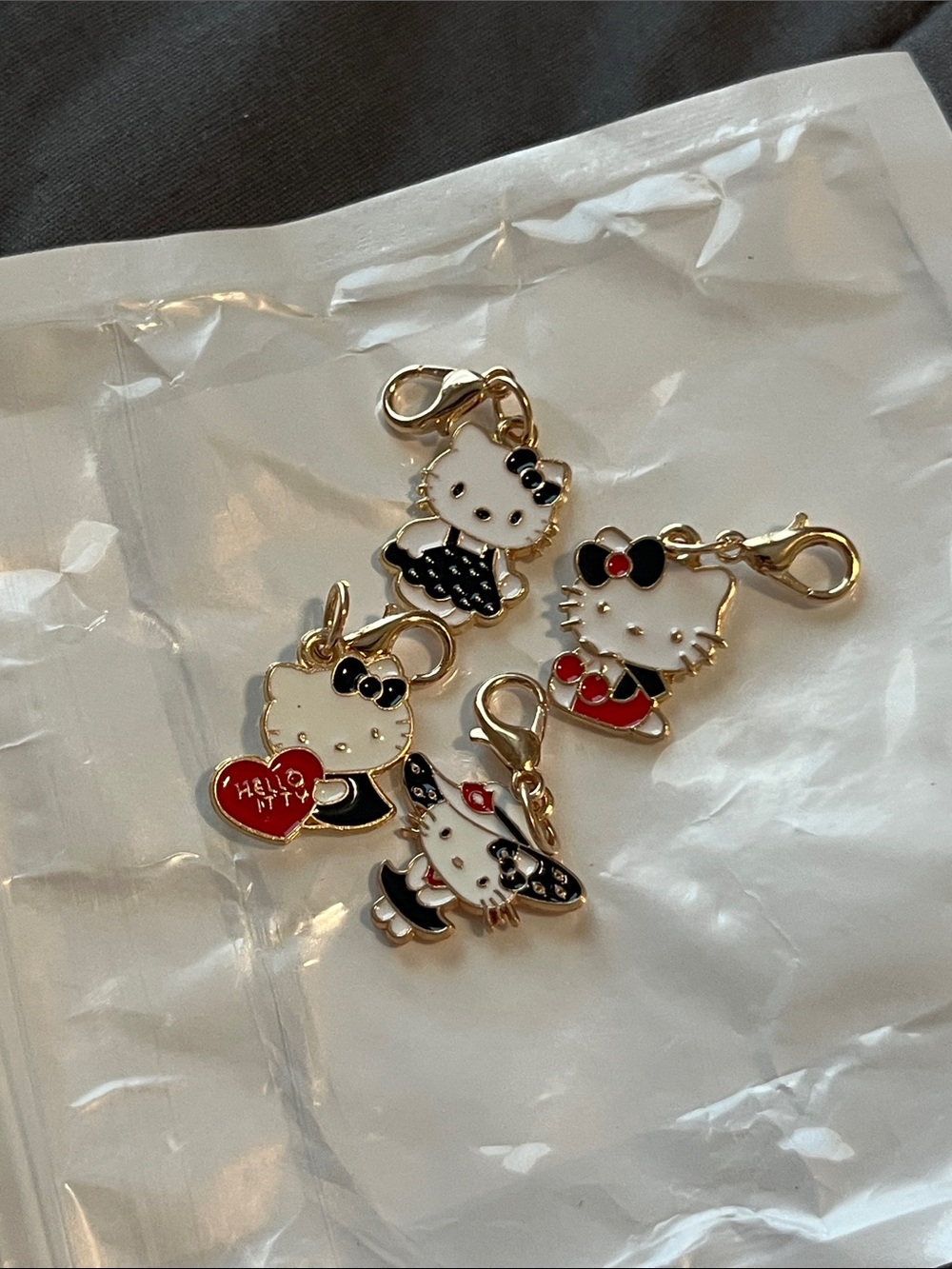 Sanrio Hello Kitty Gold-Tone Black & White Enamel zipper pulls (4)